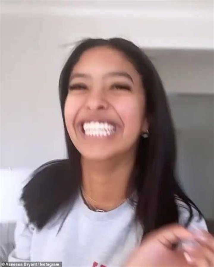Disbelief: She stops jumping and grabs her phone, all smiles, adding, 'Oh my God! This is insanity,' while her sister Capri is heard crying in the background
